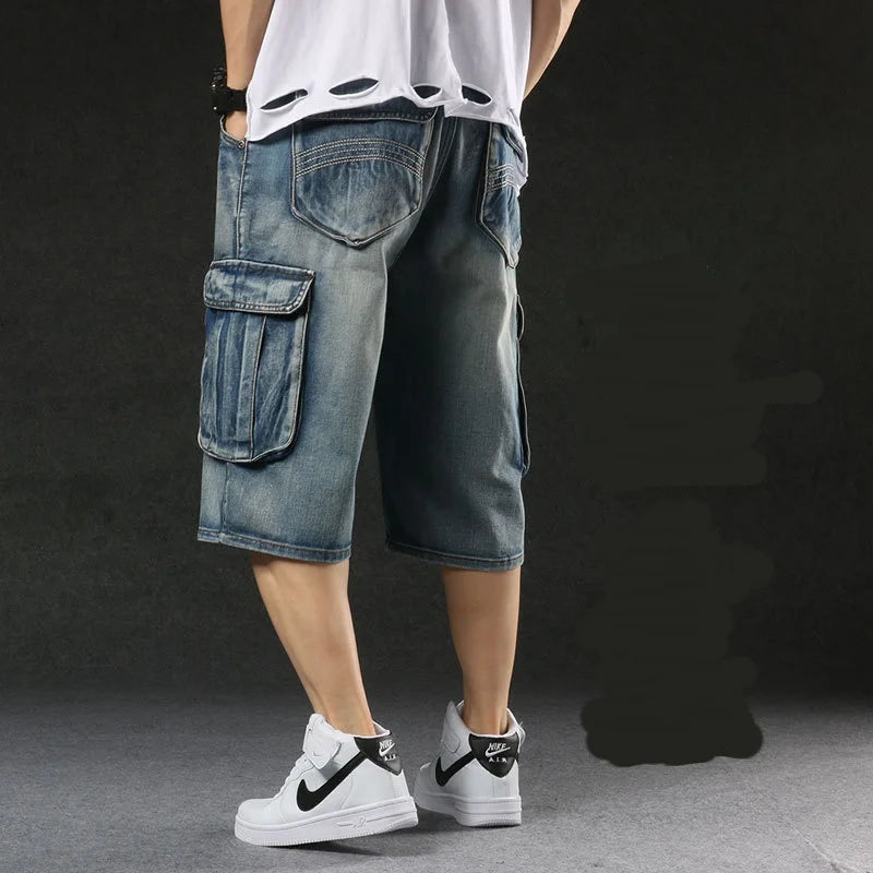 2025 new European and American multi pocket workwear seven quarter denim shorts for men with wide legs and loose denimt