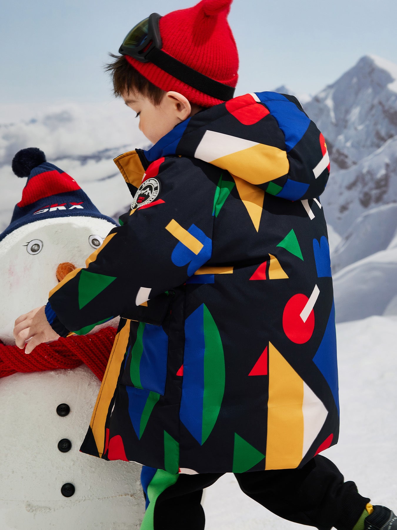 ASK JUNIOR Boys' Winter Down Jacket - Thickened Warm Mid-Length Hooded Coat with Colorful Geometric Pattern, Zip-Up Front, Pockets & Adjustable Hood for Snowy Outdoor Play, Winter Coat, Playful Winter Wear, Durable Winter Wear