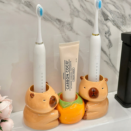 Cute Capybara Toothbrush Holder - Ceramic, No Electricity Needed, Freestanding Bathroom Storage Rack for Toothbrushes & Toothpaste, High-End Design with Orange Pumpkin Base, Bathroom Storage|Playful Design|Stylish Bathroom Accessory, Toothbrush Holder