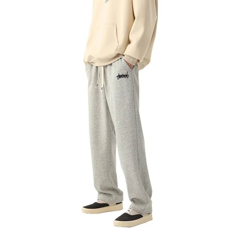 Men's solid color straight leg jogging pants, suitable for casual sports such as running, gym, and outdoor activities