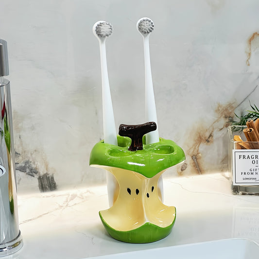 Innovative and quirky apple core ceramic toothbrush holder, both practical and decorative—a perfect choice for everyday home use or as a thoughtful holiday gift